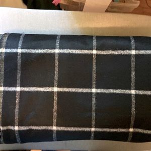 60”wide by 3 1/2 yards wool/blend. 3 1/2 inch squares. Beautiful coat fabric